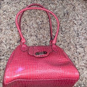 Pink alligator print purse